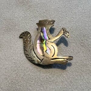Vintage aps Mexico 925 abalone embellished squirrel brooch.
